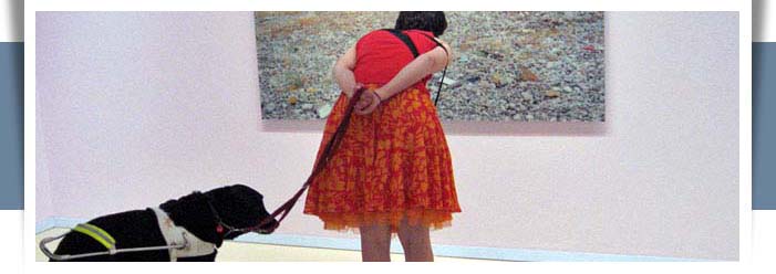 female with guide dog at museum