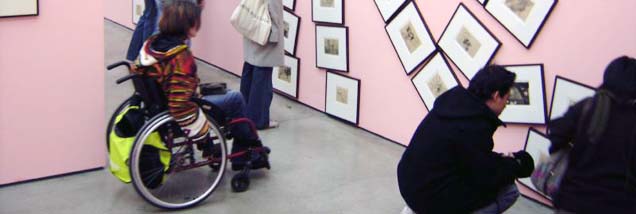 woman in wheelchair at museum
