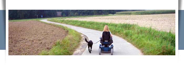 woman in wheelchair with serivce dog